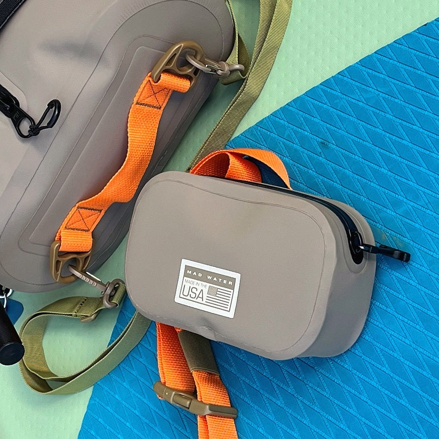 Our submersible Waterproof Waist Pack on a paddleboard