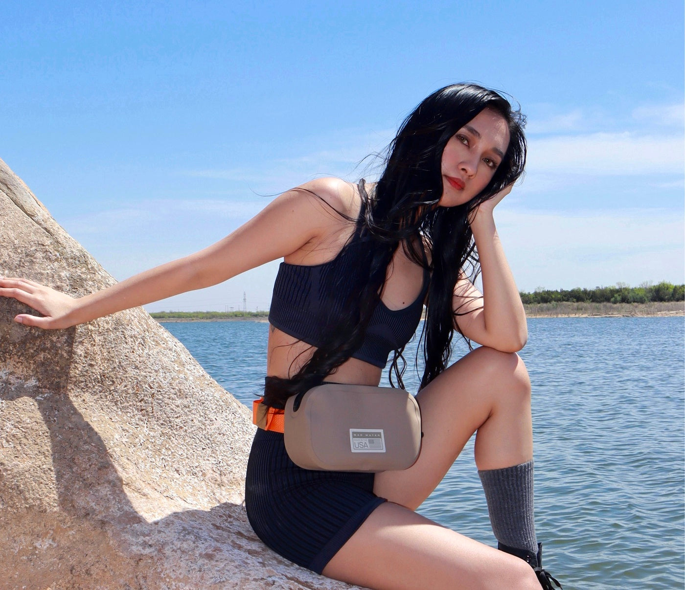 Our fully submersible waterproof waist pack worn by Leihdi Lino