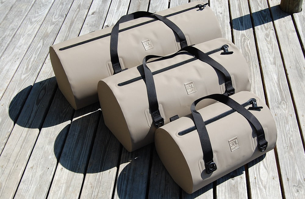 90L Waterproof USA Duffel next to 30L and 65L sizes
